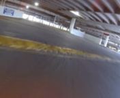 Flying around in a largely empty parking garage with a DJI Phantom in Attitude mode.A little challenging to keep from running into the ground or ceiling.Fortunately the 5.8ghz Fatshark FPV gear did a good job of not losing signal between floors on the few excursions leaving the floor.nnMusic:T.N.T. for the BrainnnSend some bitcoins my way if you liked this!n1HzzMMgMkpBrfnd6KZN4v7Fji8MMzzpHgZ