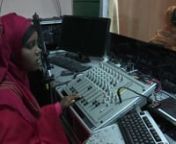STORY: SOMALIA- AMAN RADIO, VOICE OF THE WOMEN.nTRT: 3:19nSOURCE: UNSOM PUBLIC INFORMATIONnRESTRICTIONS: This media asset is free for editorial broadcast, print, online and radio use. It is not to be sold on and is restricted for other purposes. All enquiries to news@auunist.org nCREDIT REQUIRED: UNSOM PUBLIC INFORMATION nLANGUAGE: ENGLISH/NATSnDATELINE: 23 NOVEMBER 2013/MOGADISHU/ SOMALIAnnSTORYnIn a nondescript white building along the bustling Makka al Mukarramah Road, a group of women intent