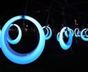 Höweler + Yoon Architecture nnSwing Time is an interactive playscape composed of 20 illuminated ring-shaped swings. The installation activates a temporary park between the Boston Convention and Exhibition Center and D Street to create a new type of city park. Custom fabricated from welded polypropylene, the swings are designed in three different sizes so that the community can engage, exercise, and play with Swing Time as individuals or in groups. LED lighting within the swing is controlled by