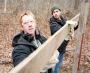Casey Jones and Evan Hill work to build a fence to block the entrance to the hiking trail at Acres Land Trust&#39;s Little Cedar Creek Wildlife Sanctuary in Huntertown, Ind., Thursday. Acres officials and Indiana DNR staff found Japanese stiltgrass on the property and decided to close the hiking paths to the public while they attempt to remove and prevent the spread of the invasive species of grass. Journal Gazette video by Chad Ryan.