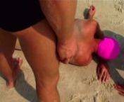 In the middle of a meticulously controlled setting (a smooth and sterilized beach), three impassive men seem to be absorbed by minimal, ritualized and enigmatic actions. Two of the protagonists play with the third one, whose pink bathing cap echoes the pink ball of the Sony Aibo dog seen at the beginning of the video. This type of robot is indeed programmed to be attracted by the pink color.nn“...In Pink Ball the protagonists are aware of the omnipresent gaze: today photography and film no lon