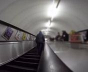 A GoPro camera rides on the handhold of an escalator of the London underground. Tube is reasonably crowded and makes impression of a grey and ordinary day of metropolis.nnDOWNLOAD LINK: http://unripecontent.com/2015/02/11/escalator-of-the-london-underground-tube-transport-free-gopro-hd-video-footage/nnDimensions: 1920 x 1080nVideo codec: H.264nColor profile: HD (1-1-1)nDuration: 00:11nFPS: 29.97