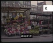 Amsterdam, 1960s Netherlands, HD from 35mm from the Kinolibrary Archive Film Collections. To order the clip clean and high res for your commercial project or to find out more visit http://www.kinolibrary.com. Available in 4K. Clip ref CHX1358. nSubscribe for more high quality, rare and inspiring clips from our extensive archive of footage.nn1960s NETHERLANDS, Amsterdam NIGHT EXT HA WS city centre, trams, busy streets. Shops. Ha City Centre. Main Street Night. Pans L-R To Trams Through Main Stree