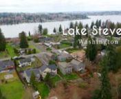 Lake Stevens, WA &#124; Lindsay NcCorchuk &#124; 425-870-6510 &#124; Beautiful 2018 craftsman at the end of a private driveway, just blocks from the lake and situated on a fully fenced 16,000+ sqft lot! This home offers many custom touches throughout, 4 beds, bonus room, loft area and 2.5 baths. Spacious kitchen with SS appliances, white cabinetry, quartz countertops, abundance of storage/ counter space, and butlers pantry. Hardwood throughout main floor, AC, and gas fireplace in main living room. Primary bedr