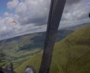 Paragliding on the NW face of Mam Tor in July 2012. The weather had been bad for a while so lots of pilots got out when it became flyable.