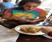 This girl was preparing to take a photo of her food at a restaurant. Just as she was about to click the picture, her friend smushed up the food with a spoon, leaving her shocked and disappointed.