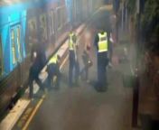 Dramatic CCTV footage has been released that shows a woman being saved from rail tracks, just moments before a train arrives at a Melbourne station.