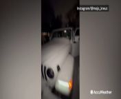 Watch as the owners of this Jeep in Buffalo, New York, completely remove this large sheet of ice off the front side of the vehicle in one piece.