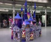 Designer Paul Jackson made the origami version of the Disneyland castle at St Pancras International station (London)