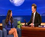 Nina Dobrev gets all footsy with Conan while demonstrating her yoga.