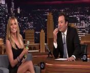 Heidi Klum talks to Jimmy about dumping drinks on fellow America&#39;s Got Talent judge Simon Cowell and shows off her golden buzzer-worthy talents with a song.