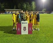 Needham Market celebrate a fourth straight Suffolk Premier Cup success after victory over Felixstowe & Walton United at Bury Town FC from movieclips buried