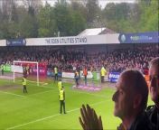 Crawley Town fans celebrate League Two play-off qualification at the end of their win over Grimsby - cheers are followed by a friendly pitch invasion