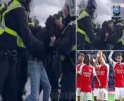 Footage has emerged from the north London Derby showing police officers clashing with fans outside the Tottenham Hotspur Stadium. &#60;br/&#62;&#60;br/&#62;Arsenal came away from the clash against their bitter rivals with all three points after surviving an impressive second-half comeback from the hosts, the Gunners eventually winning 3-2.&#60;br/&#62;&#60;br/&#62;Bukayo Saka and Kai Havertz struck for the visitors after a Pierre-Emile Hojbjerg own goal, and although Cristian Romero and Son Heung-min netted in a frantic second half, Mikel Arteta&#39;s side held firm. &#60;br/&#62;&#60;br/&#62;The Gunners ended the weekend top of the Premier League as a result, while they also secured back-to-back wins at Tottenham in the league for the first time in 36 years. &#60;br/&#62;&#60;br/&#62;However, ugly scenes have since emerged from the match with cameras catching the moment fans appeared to clash with police outside the ground. &#60;br/&#62;&#60;br/&#62;The video shows a large group of police officers fighting with fans, with some supporters visibly being dragged along the ground by several bodies. &#60;br/&#62;&#60;br/&#62;Another appears to be shoved to the ground before being struck repeatedly by officers, who were wearing riot helmets and high-vis jackets. &#60;br/&#62;&#60;br/&#62;When another intervenes, seemingly to aid the other supporter, they look to be dragged away.&#60;br/&#62;&#60;br/&#62;Throughout the conflict outside the ground, projectiles and drinks can be seen thrown at the police officers by onlookers.&#60;br/&#62;&#60;br/&#62;Another clip was posted on TikTok that showed several home supporters inside the ground looking out onto a conflict between police officers and a large group of fans. &#60;br/&#62;&#60;br/&#62;It is unclear whether the two clips are of the same incident at the Tottenham Hotspur Stadium. &#60;br/&#62;&#60;br/&#62;There had been reports of away supporters finding a way into the home end for the clash between the bitter local rivals. &#60;br/&#62;&#60;br/&#62;One Arsenal supporter was seen full-time in the home area revealing their Arsenal shirt as the players came over to celebrate their huge victory.&#60;br/&#62;&#60;br/&#62;In an interview after the game, he explained he&#39;d not realized he had bought a ticket for the wrong part of the stadium, having jetted from Australia to watch his beloved side play.&#60;br/&#62;&#60;br/&#62;There is plenty of tension between the two local rivalries, who have long been historic foes, with abuse regularly hurled at players on the pitch from both parties. &#60;br/&#62;&#60;br/&#62;Last season&#39;s clash at the Tottenham Hotspur Stadium saw a fan kick Aaron Ramsdale in the back before beating a hasty retreat. &#60;br/&#62;&#60;br/&#62;At full-time in the 2-0 win, Ramsdale made his way back towards Spurs fans to collect his water bottle before a fan clambered down from the stands and appeared to kick the goalkeeper. &#60;br/&#62;&#60;br/&#62;The fan, later identified as Joseph Watts of Hackney, was charged by police and pleaded guilty to assaulting the Arsenal goalkeeper.