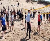 Prince William joins in a game of volleyball from join marketing