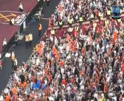Luton fans clashed with stewards as their side&#39;s hopes of the Premier League suffered a major blow in defeat to West Ham.&#60;br/&#62;&#60;br/&#62;A video shared on social media showed dramatic scenes in the away end during the game&#39;s closing stages as some traveling supporters became embroiled in a melee with stewards.&#60;br/&#62;&#60;br/&#62;The disruption is said to have been caused by stewards attempting to remove at least two fans from the lower tier.&#60;br/&#62;&#60;br/&#62;Additional stewards rushed to the commotion and were promptly supported by police who could de-escalate the situation while avoiding further incidents.&#60;br/&#62;&#60;br/&#62;Rob Edwards&#39; side started the game brightly at the London Stadium, with Albert Sami Lokonga giving them the lead after just six minutes.&#60;br/&#62;&#60;br/&#62;But the visitors suffered a significant blow later in the first half as talisman Ross Barkley was forced off injured with a calf problem that could prove to be the end of his campaign.&#60;br/&#62;&#60;br/&#62;After a sluggish start to proceedings, West Ham responded emphatically after the restart with James Ward-Prowse leveling proceedings before Tomas Soucek put the Hammers ahead.&#60;br/&#62;&#60;br/&#62;George Earthy then added a third for the hosts that confirmed the Hatters will be playing Championship football again next season.&#60;br/&#62;&#60;br/&#62;Luton&#39;s relegation would have been made official if Nottingham Forest had managed to secure a point against Chelsea in Saturday&#39;s late kick-off.&#60;br/&#62;&#60;br/&#62;However, Nuno Espirito Santo&#39;s side ultimately fell to a 3-2 defeat, taking their fight for top-flight survival to the final day.&#60;br/&#62;&#60;br/&#62;Luton is just three points behind Forest a significant disparity in the two clubs&#39; goal difference makes relegation all but an inevitability for the club.&#60;br/&#62;&#60;br/&#62;Speaking following their defeat Edwards hailed the club&#39;s fans for their support throughout the campaign.&#60;br/&#62;&#60;br/&#62;&#39;We didn’t get relegated because of today, it was a culmination of the whole season,&#39; he said.&#60;br/&#62;&#60;br/&#62;‘I&#39;m an emotional person and walking over to our supporters and seeing their reaction brought me to tears. The love and affection they have given us, which goes both ways and is unique in football these days. &#60;br/&#62;&#60;br/&#62;&#39;I feel devastated, I didn&#39;t want to let anyone down and I feel responsible. I thanked the players and staff, they&#39;ve given me the best 18 months of my life.’