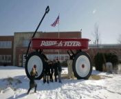 Radio Flyer employees do the Harlem Shake in front of the World&#39;s Largest Wagon at our Chicago