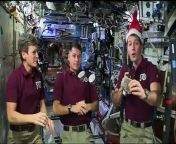 Excited about what they&#39;d have for dinner, the crew aboard the International Space Station sent the world a cheerful Christmas dispatch from 225 miles above Earth on Sunday.