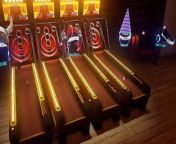 Preview trailer of SportsBarVR containing pre-release gameplay footage of a multiplayer hangout session with Four (4) players interacting with each other and their environment as well as playing Pool, Air Hockey, Darts, and Skeeball.
