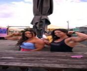Watch Two Ladies Flexing Arm Muscles_Public Event from candid trample