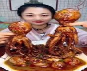 Cute Asian Eating Cooked Octopus from asmr eating seafood